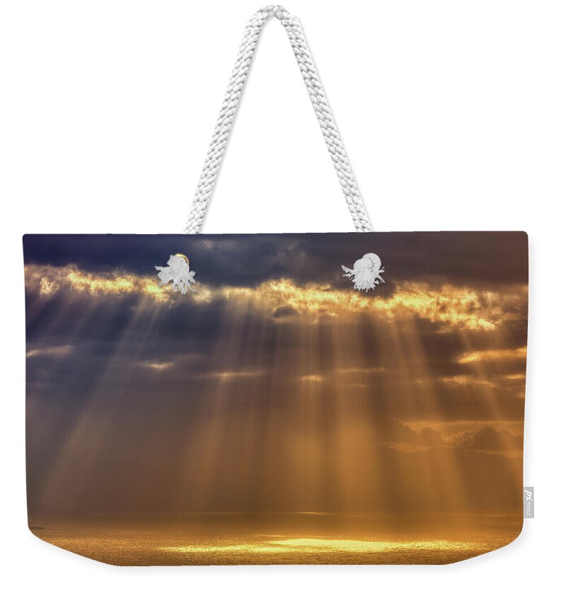 Dawn Weekender Tote Bag featuring the photograph Rays Of Sun Peeking Through Clouds by Zodebala