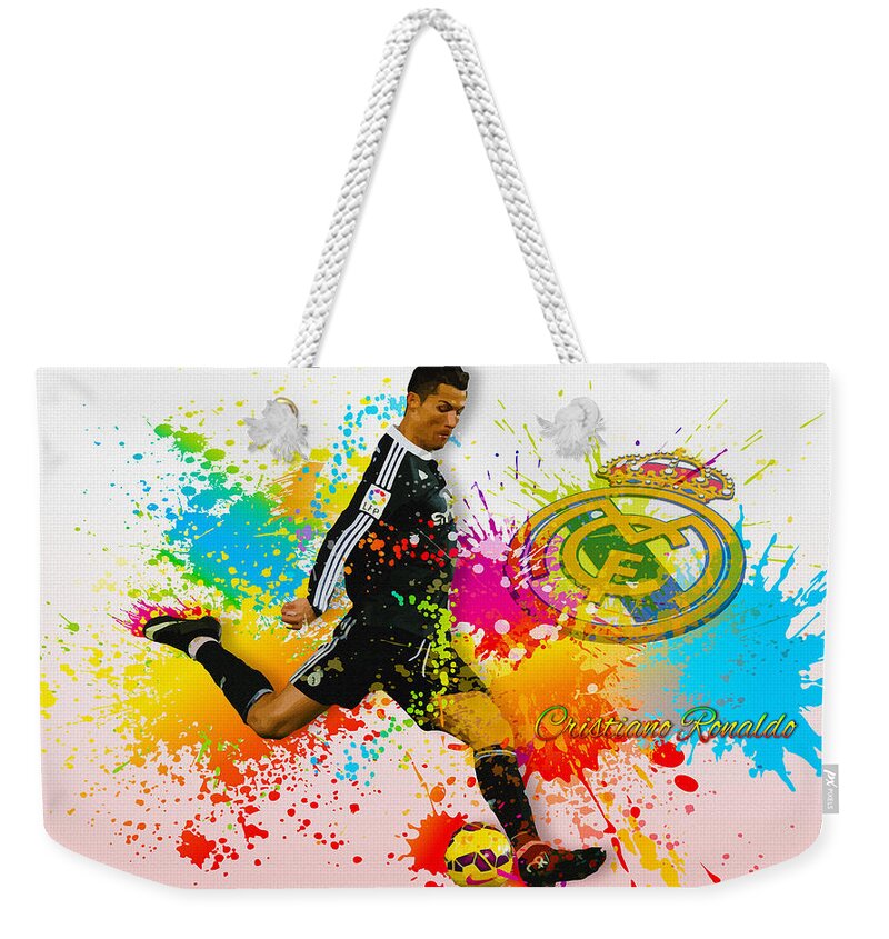 Football Weekender Tote Bag featuring the digital art Real Madrid - Portuguese forward Cristiano Ronaldo by Don Kuing