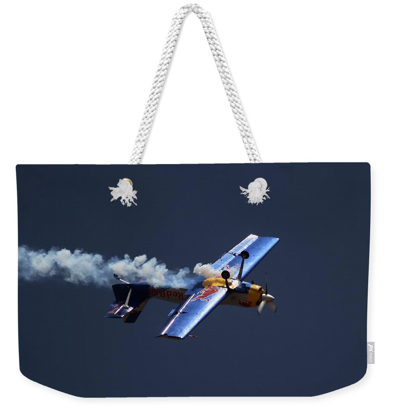 Redbulls Aerobatics Weekender Tote Bag featuring the photograph Red Bull - Inverted Flight by Ramabhadran Thirupattur