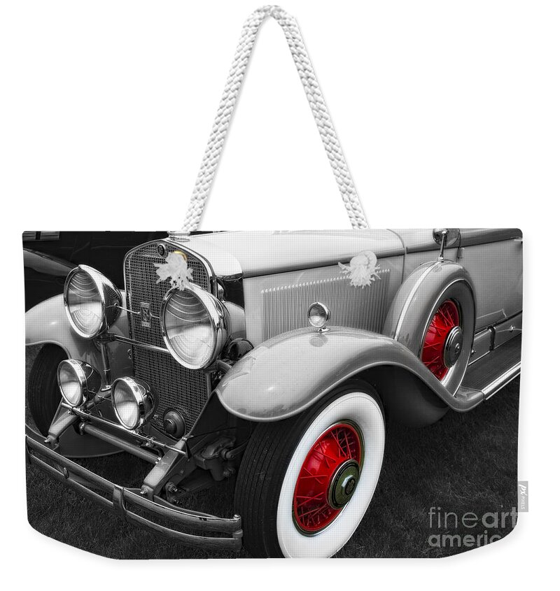 Automobiles Weekender Tote Bag featuring the photograph Red Caps by Timothy Hacker
