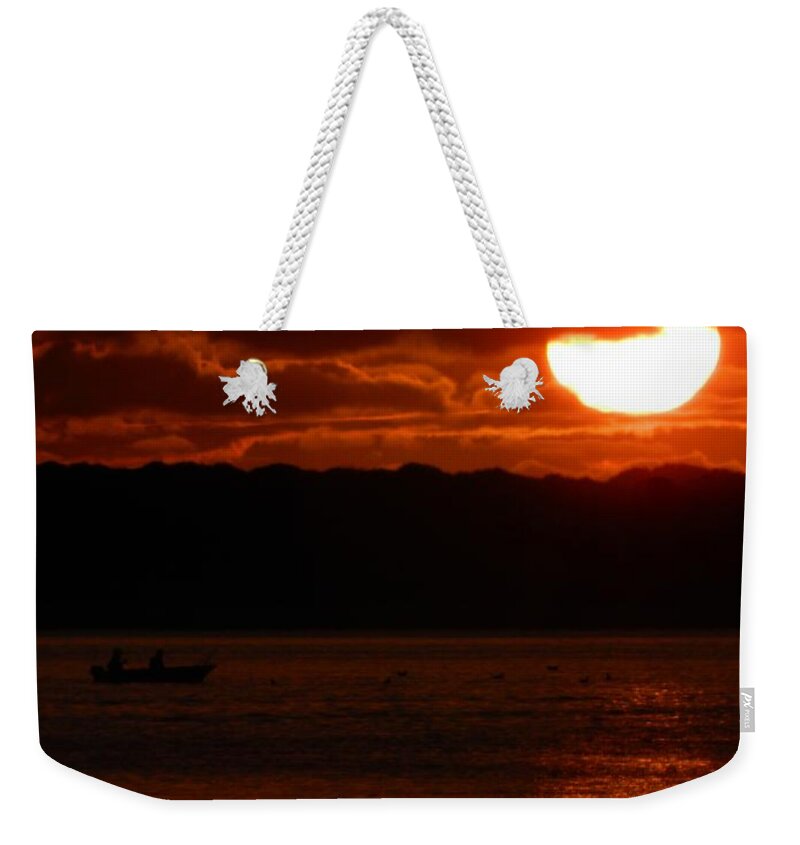 Sunset Weekender Tote Bag featuring the photograph Red Sky by Gallery Of Hope 