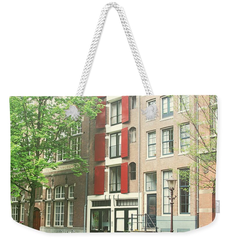 Amsterdam Weekender Tote Bag featuring the photograph Red Windows by Ivy Ho