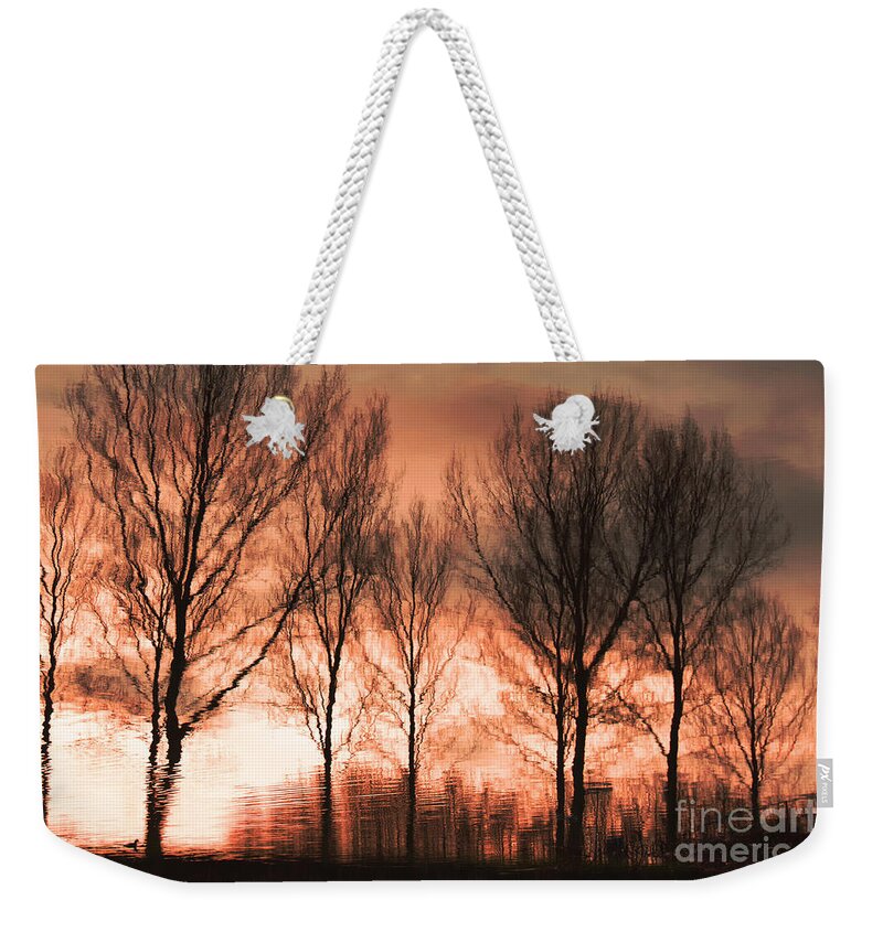 Landscape Weekender Tote Bag featuring the photograph Reflection in red by Adriana Zoon