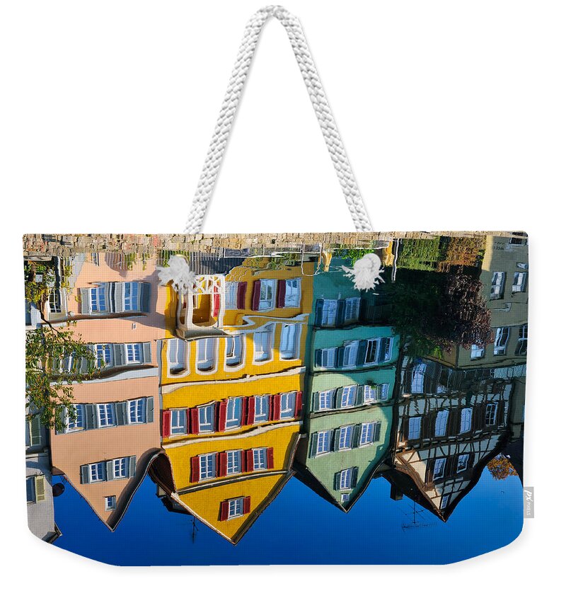 Reflection Weekender Tote Bag featuring the photograph Reflection of colorful houses in Neckar river Tuebingen Germany by Matthias Hauser