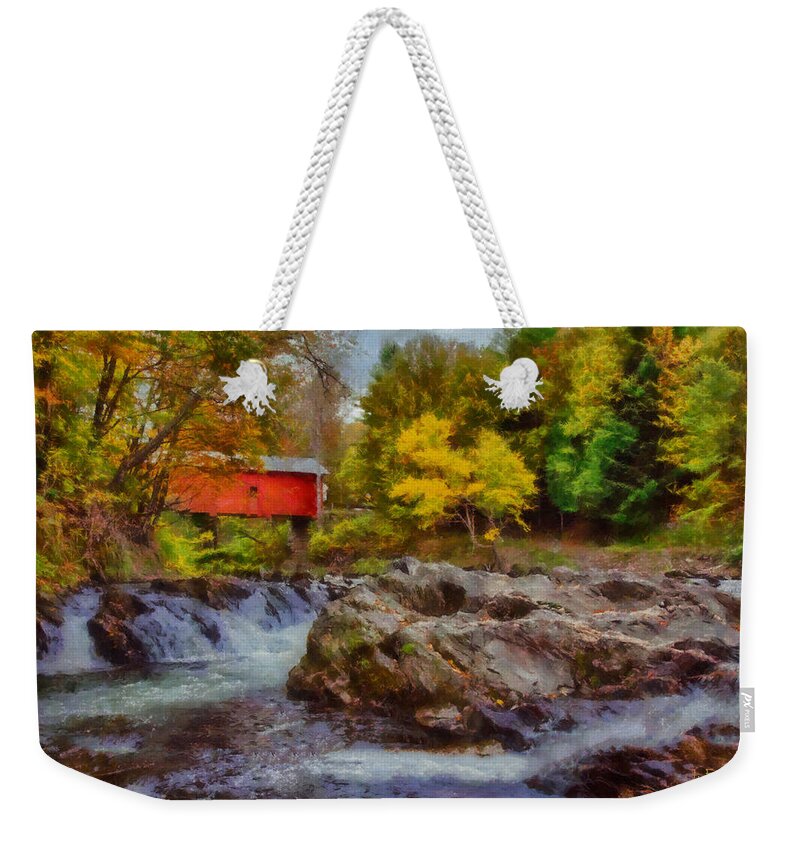 Autumn Foliage Weekender Tote Bag featuring the photograph River runs under Slaughter House covered bridge by Jeff Folger