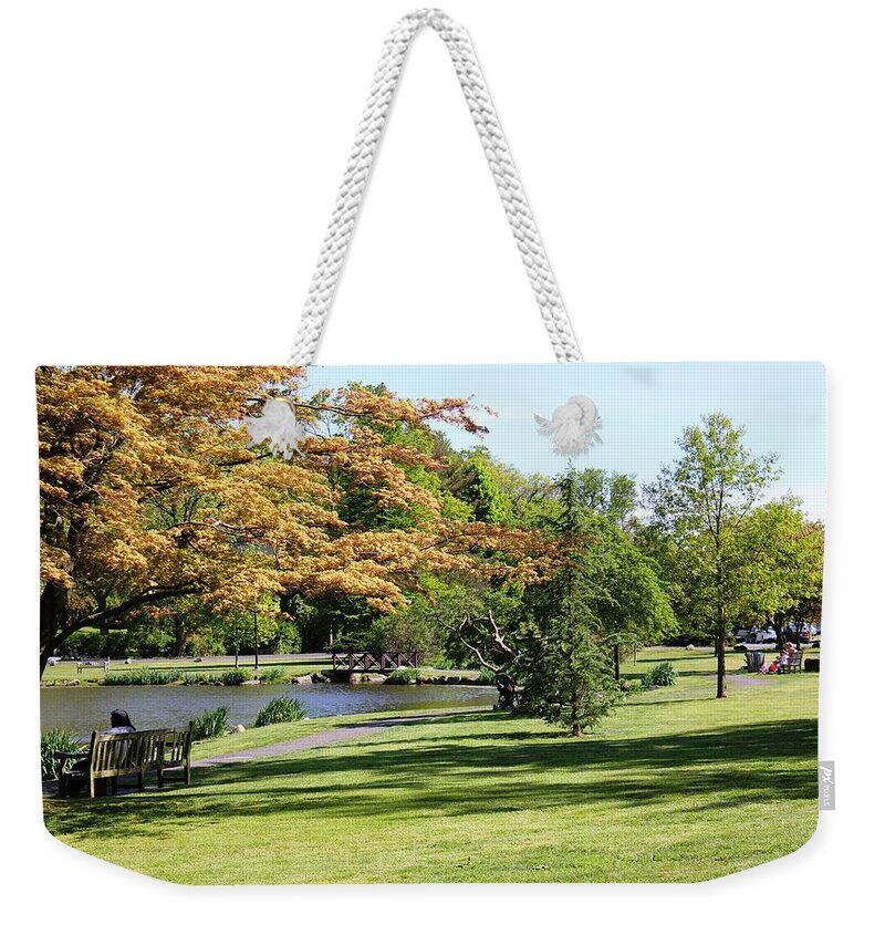 Park Weekender Tote Bag featuring the photograph Relaxing in the Park by Judy Palkimas