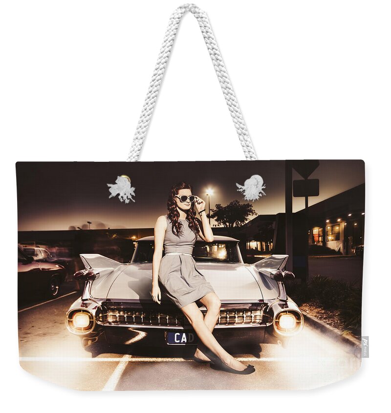 Girl Weekender Tote Bag featuring the photograph Retro Sixties Pinup Girl On Vintage Car by Jorgo Photography
