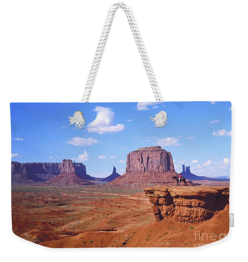 Nature Weekender Tote Bag featuring the photograph Rider At Monument Valley by Adam Sylvester
