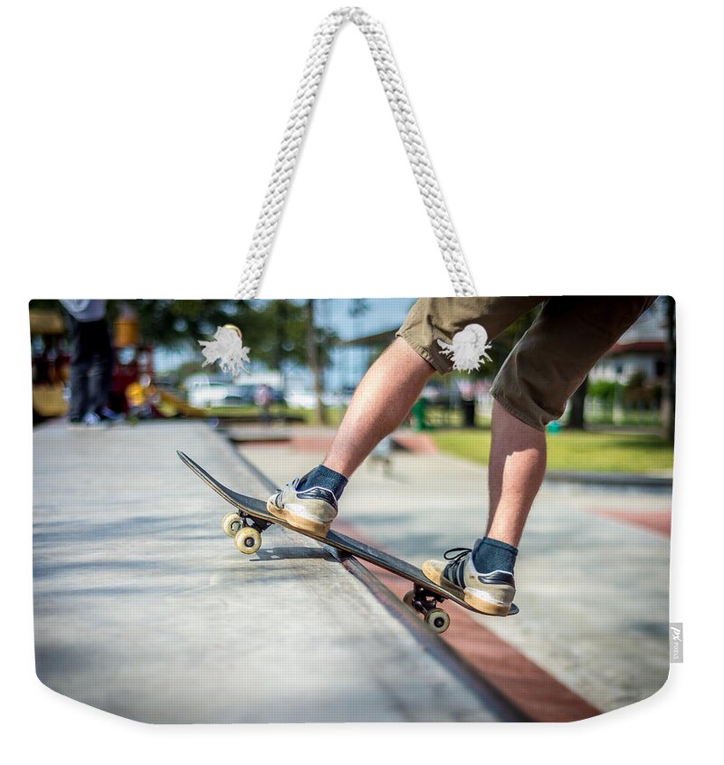 Alvin Weekender Tote Bag featuring the photograph Riding the Rail by David Morefield