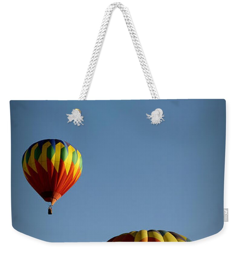 Hot Weekender Tote Bag featuring the photograph Rise Above by Luke Moore