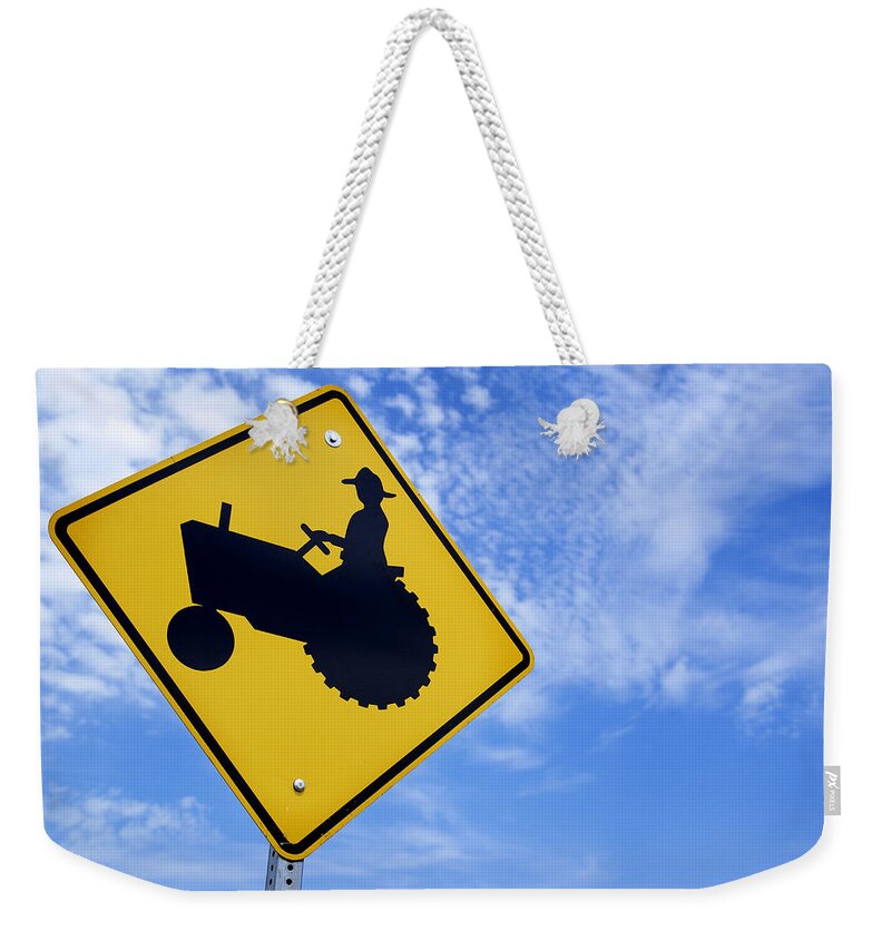 Sign Weekender Tote Bag featuring the photograph Road Sign Tractor Crossing by Donald Erickson