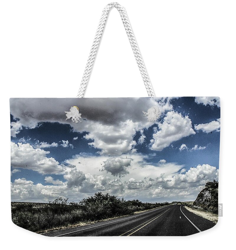 Big Bend Weekender Tote Bag featuring the photograph Marfa Cloudscape by Rebecca Dru