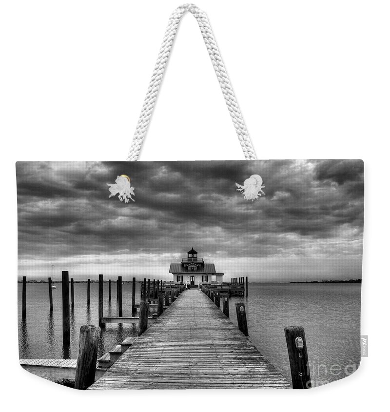 North Carolina Weekender Tote Bag featuring the photograph Roanoke Marshes Light 2 BW by Mel Steinhauer