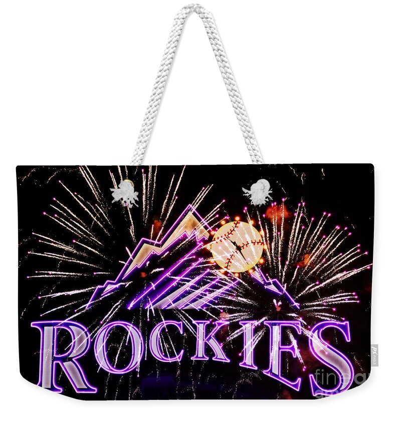 Colorado Weekender Tote Bag featuring the photograph Rockies and Fireworks by Bob Hislop
