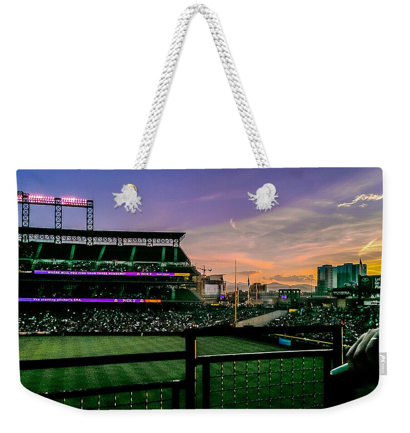 Baseball Weekender Tote Bag featuring the photograph Rockies game at sunset by Stacy Abbott