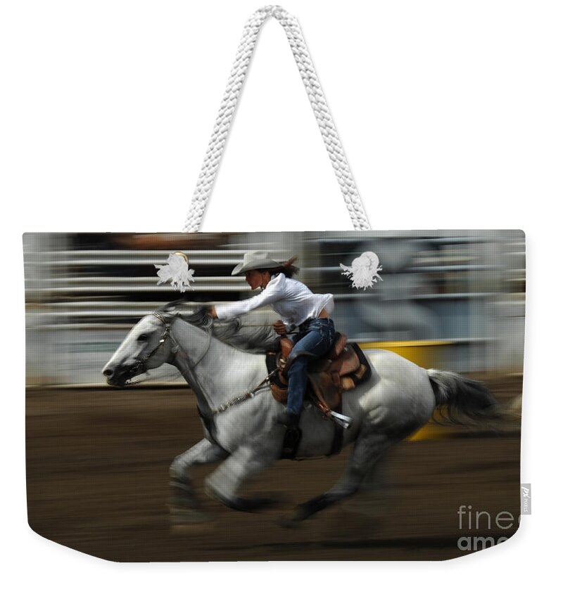 Horse Weekender Tote Bag featuring the photograph Rodeo Riding A Hurricane 1 by Bob Christopher