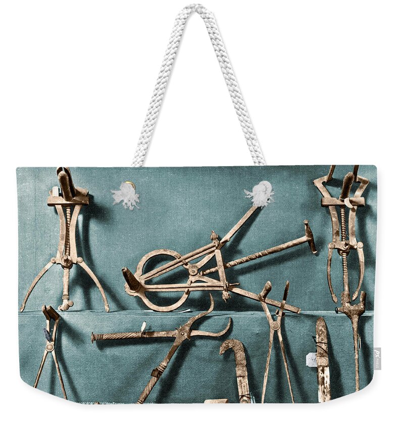Science Weekender Tote Bag featuring the photograph Roman Surgical Instruments, 1st Century by Science Source