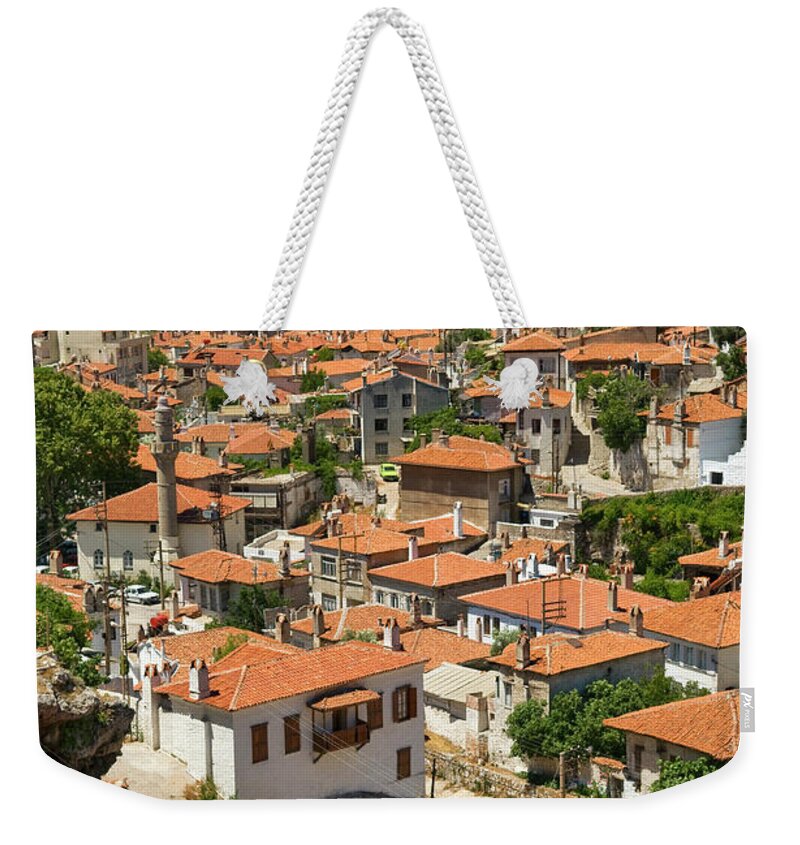 Built Structure Weekender Tote Bag featuring the photograph Rooftops Of Old Houses In Saburhane by Izzet Keribar