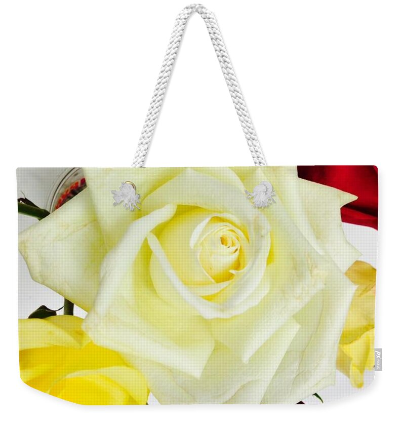 Roses Weekender Tote Bag featuring the photograph Roses by Felix Zapata
