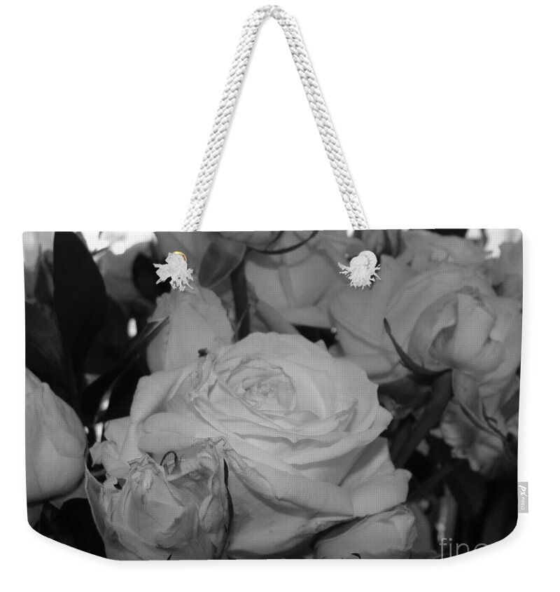 Roses Weekender Tote Bag featuring the photograph Roses by Tiziana Maniezzo