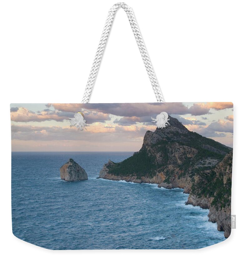 Tranquility Weekender Tote Bag featuring the photograph Rough Seas Battering The Formentor by David C Tomlinson