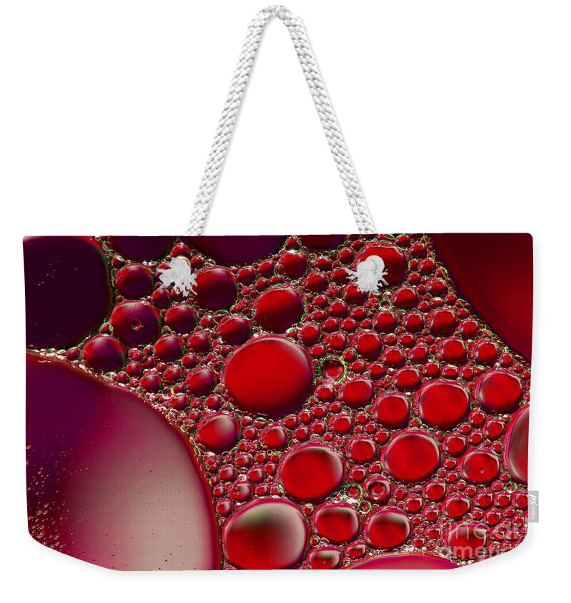 Rubies Weekender Tote Bag featuring the photograph Rubies by Sharon Talson