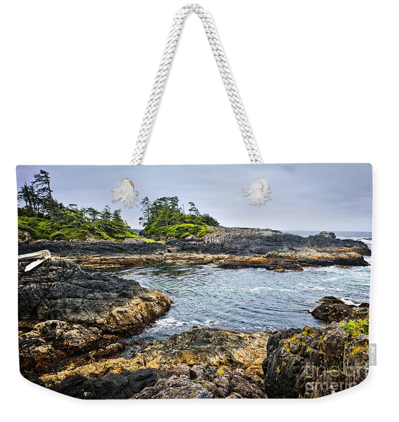 Pacific Weekender Tote Bag featuring the photograph Rugged coast of Pacific ocean on Vancouver Island by Elena Elisseeva