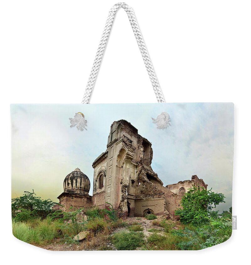 Grass Weekender Tote Bag featuring the photograph Ruins Of Gurdwara by Haseeb Ahmed Khan