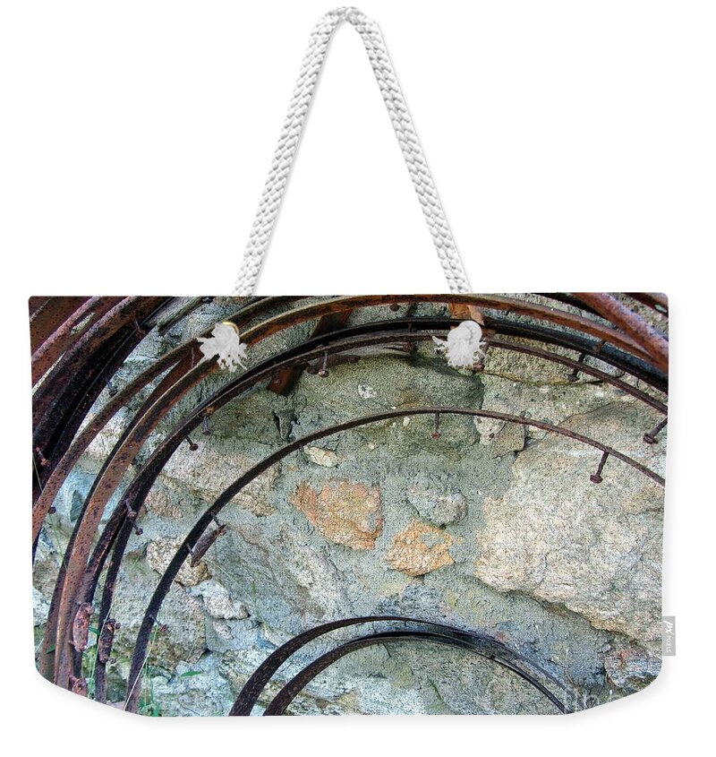 Rust Weekender Tote Bag featuring the photograph Rusted Rims - Blacksmith Shop - Waterloo Village by Susan Carella