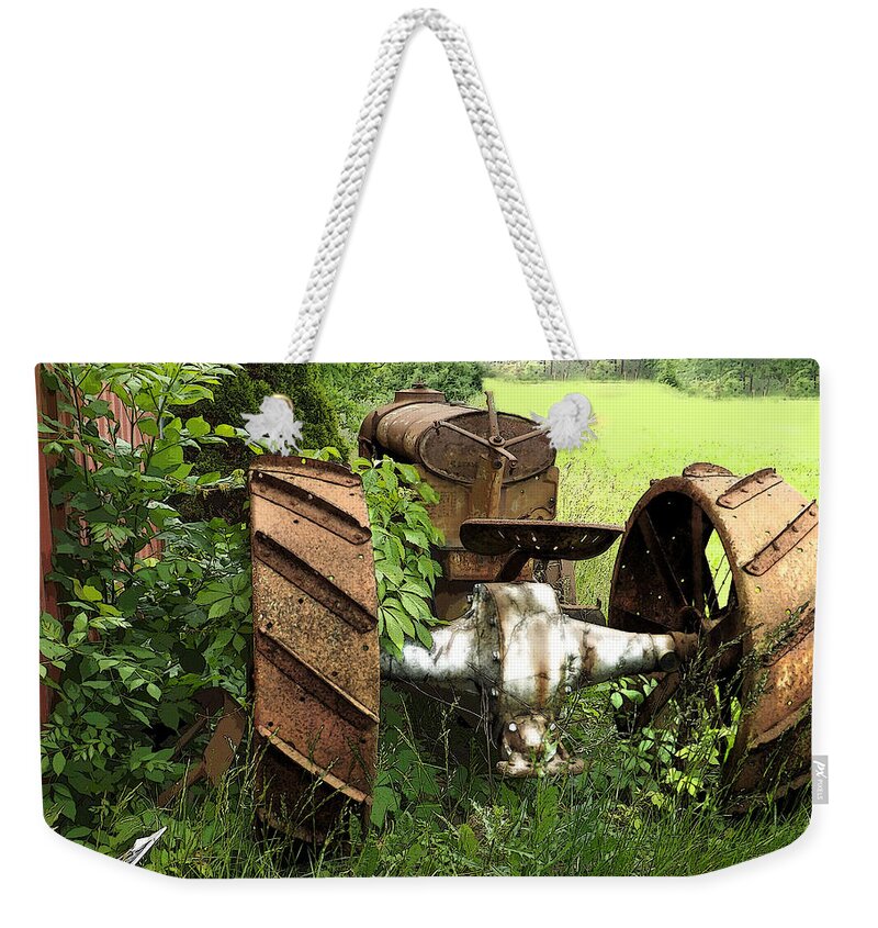 Rust Weekender Tote Bag featuring the photograph Rusty Tractor 1 by Joyce Wasser