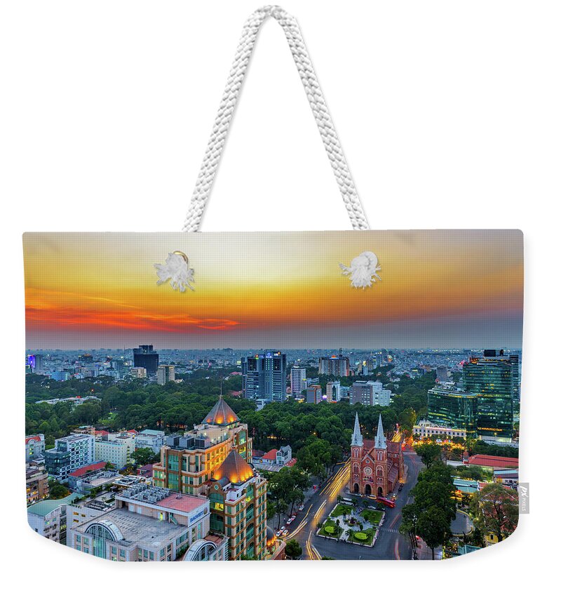 Ho Chi Minh City Weekender Tote Bag featuring the photograph Saigon Notre Dame Cathedral In The by Phung Huynh Vu Qui