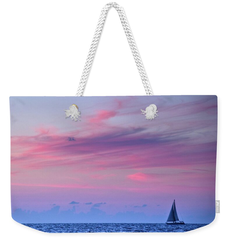 Scenics Weekender Tote Bag featuring the photograph Sail Boat On The Sea At Dusk by Ilan Shacham