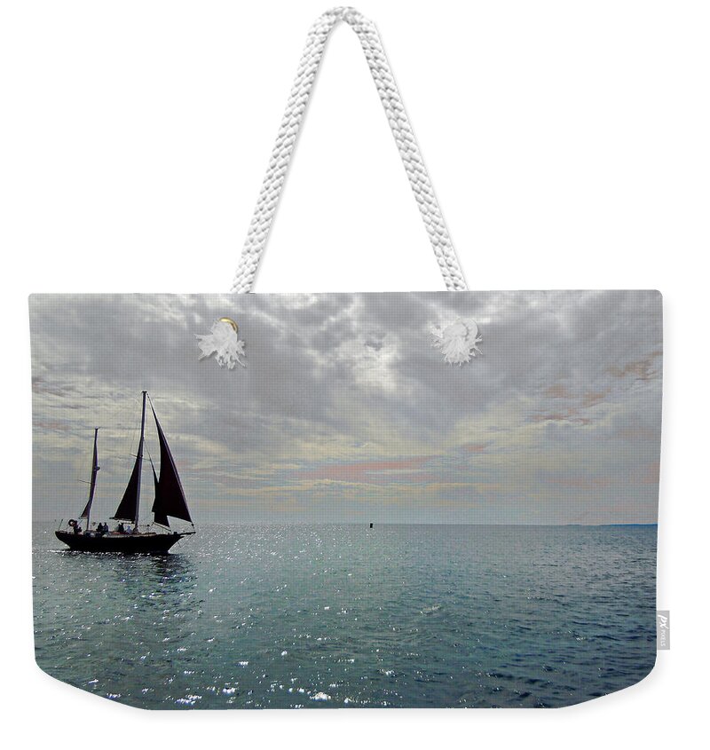Maine Weekender Tote Bag featuring the photograph Sailboat at Sea by Nancy Griswold