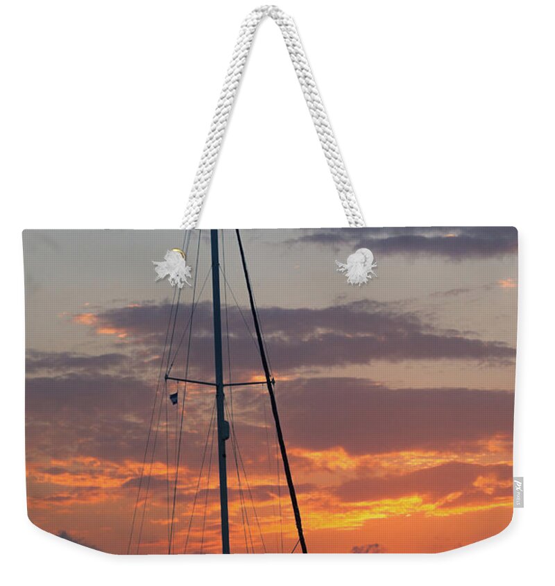 Sailboat Weekender Tote Bag featuring the photograph Sailboat At Sunset by Thepalmer