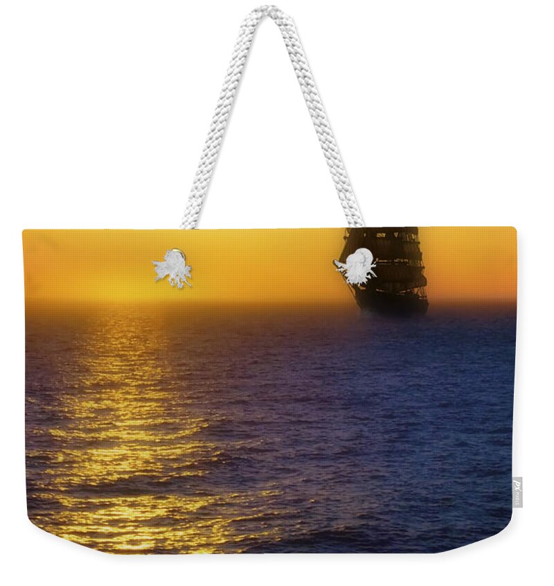 Sailing Ship Weekender Tote Bag featuring the photograph Sailing out of the Fog at Sunrise by Jason Politte