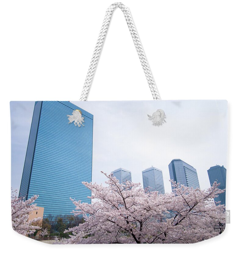 Osaka Prefecture Weekender Tote Bag featuring the photograph Sakura With Buildings by Silence Photo
