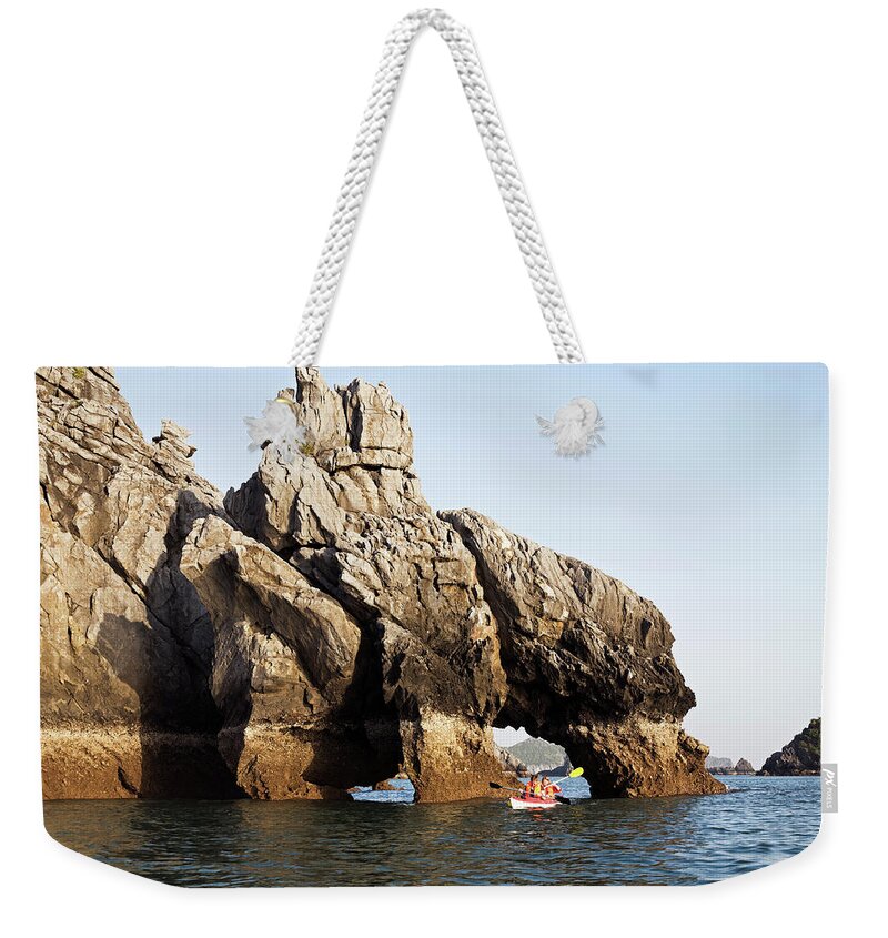 Toughness Weekender Tote Bag featuring the photograph Seakayaking In Halong Bay Past Double by Anders Blomqvist