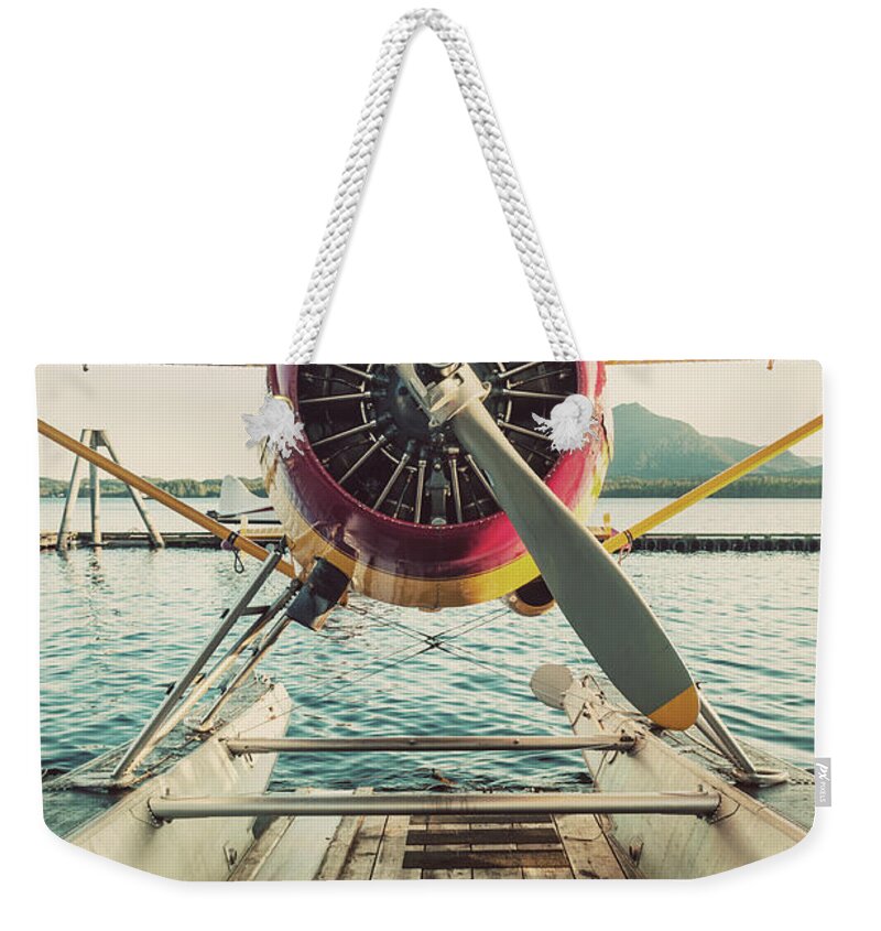 Propeller Weekender Tote Bag featuring the photograph Seaplane Dock by Shaunl