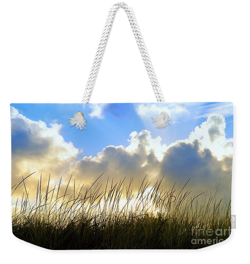 Seaside Weekender Tote Bag featuring the photograph Seaside Grass and Clouds by Sharon Woerner