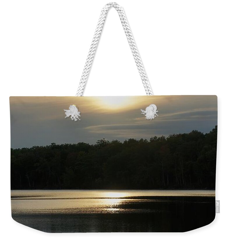 Sun Weekender Tote Bag featuring the photograph Setting Sun Reflections on Lake by Lilliana Mendez