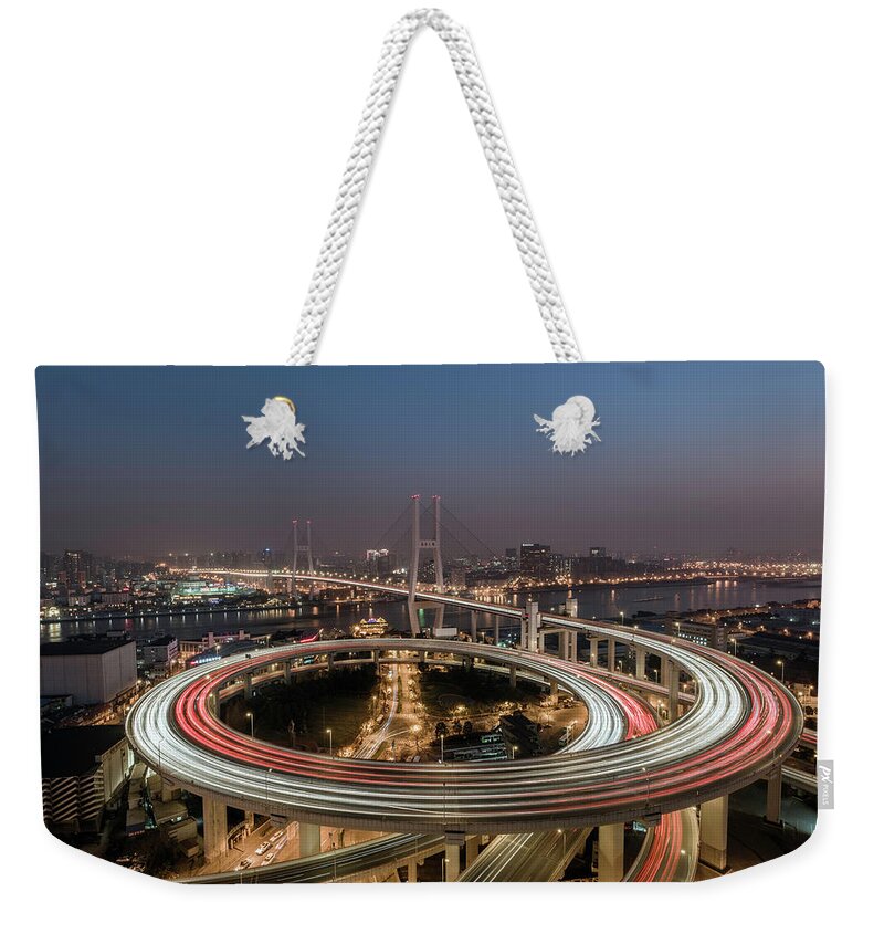 Built Structure Weekender Tote Bag featuring the photograph Shanghai, Elevated View Of Nanpu Bridge by Martin Puddy