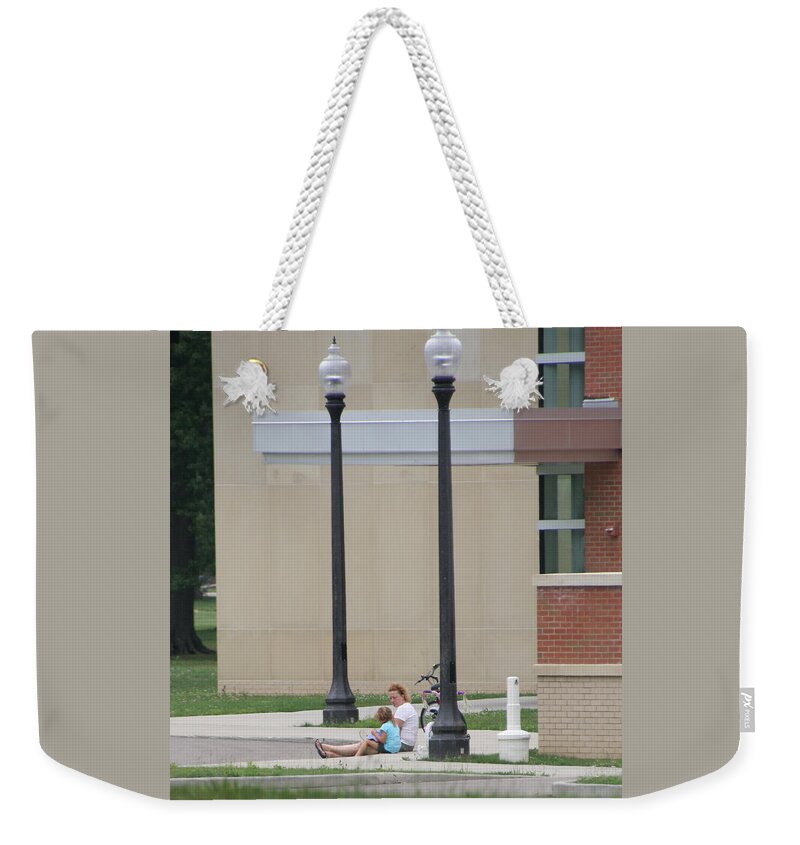 Two Unrecognizable People One Woman Weekender Tote Bag featuring the photograph Sharing a moment by Valerie Collins