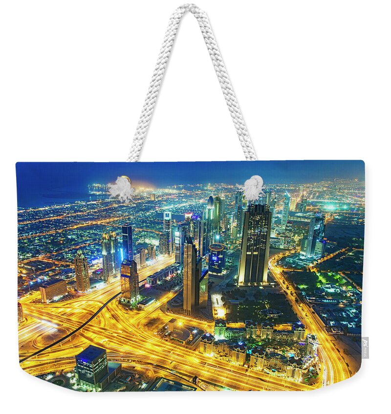 Architectural Feature Weekender Tote Bag featuring the photograph Sheikh Zayed Road Skyline Of Dubai by Eli asenova