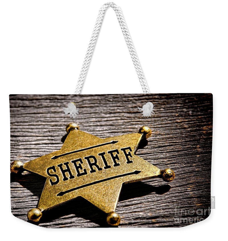 Sheriff Weekender Tote Bag featuring the photograph Sheriff Badge by Olivier Le Queinec