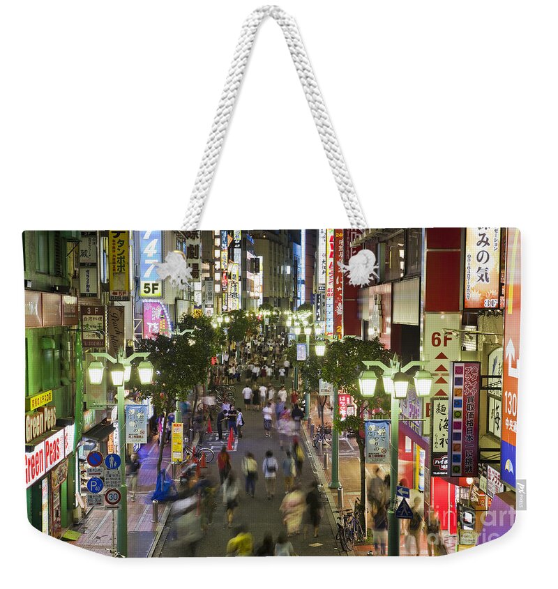 Neon Lights Weekender Tote Bag featuring the photograph Shinjuku Street Scene at Night by Bryan Mullennix