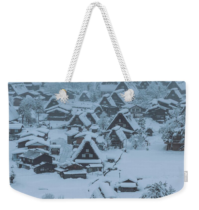 Scenics Weekender Tote Bag featuring the photograph Shirakawa Historical Village In Snow by Nobythai