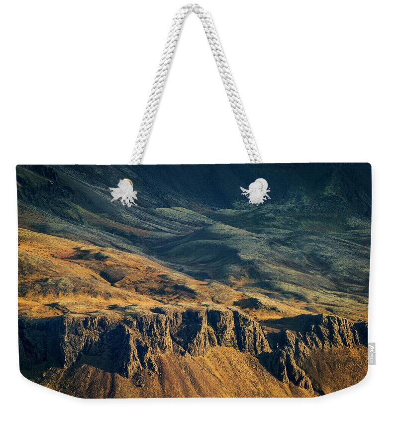 Dramatic Landscape Weekender Tote Bag featuring the photograph Side Of Hills And Cliffs by Arctic-images