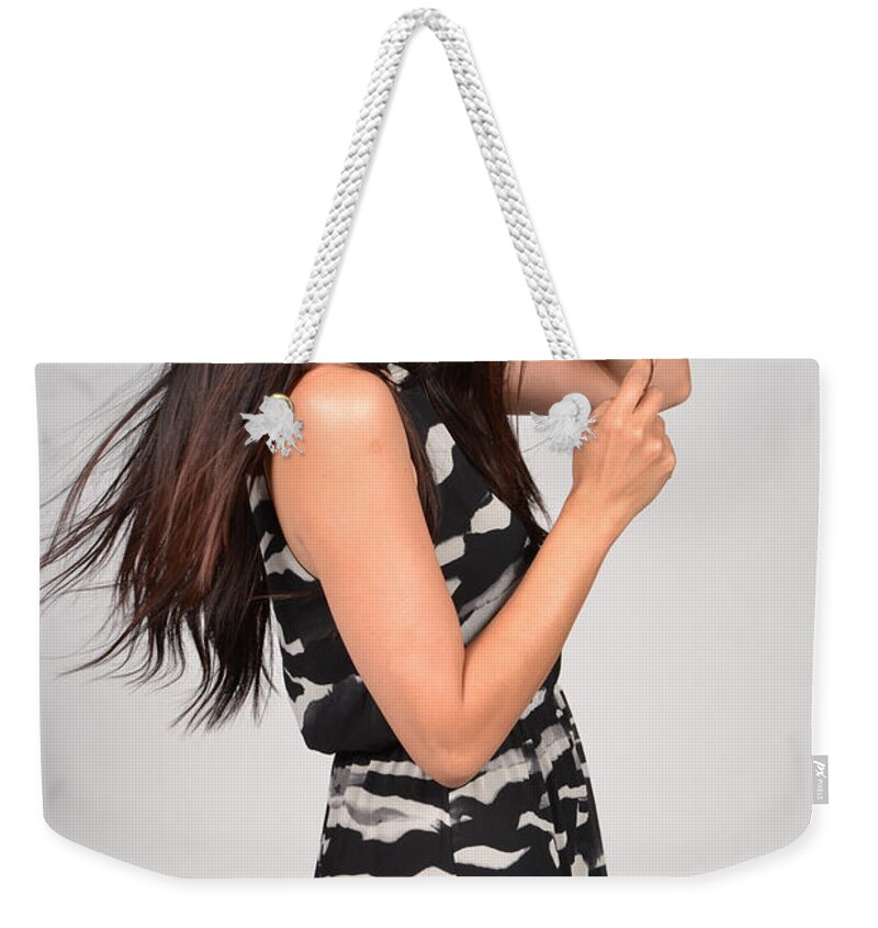 Female Weekender Tote Bag featuring the photograph Sideways Glance Female Asian Model by Heather Kirk