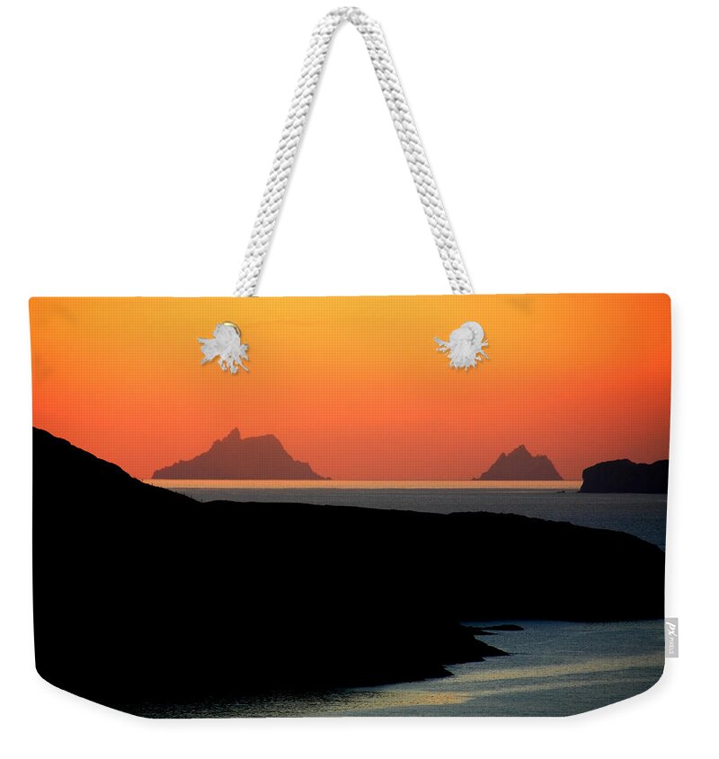 Sunset Weekender Tote Bag featuring the photograph Skellig Islands by Aidan Moran