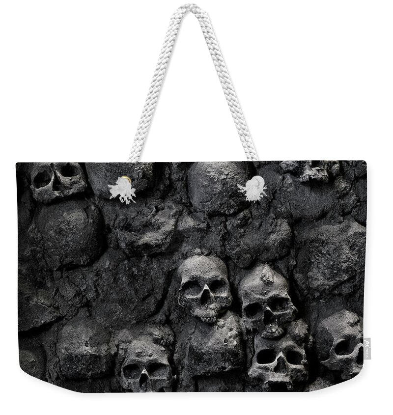 Horror Weekender Tote Bag featuring the photograph Skulls by Bruno Ehrs
